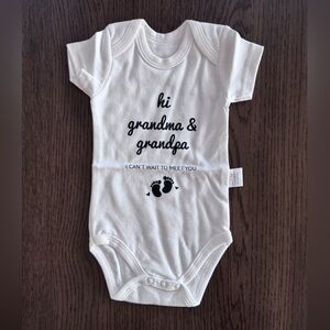 Brand New 0-3 Months White Baby Onesie with Footprint Graphic